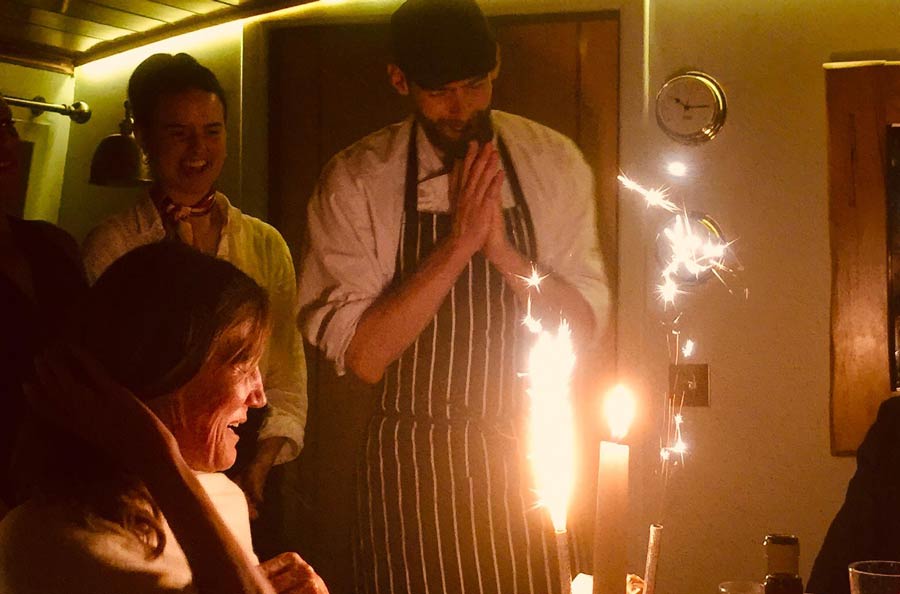 Chef with birthday cake