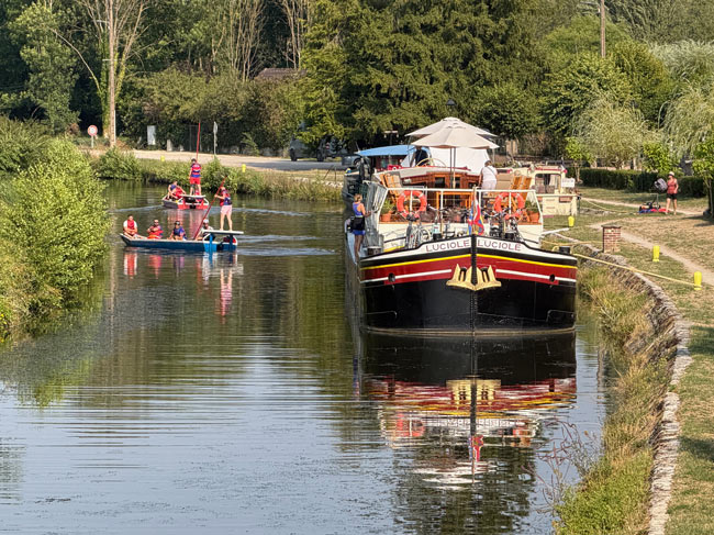 Luciole passengers relaxing beside the Burgundy canal