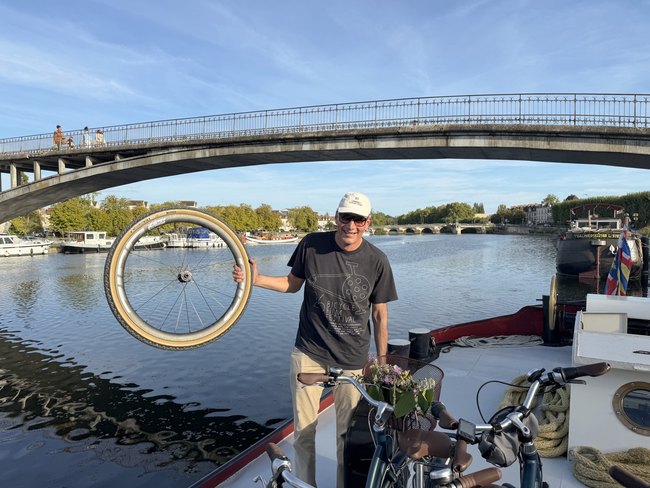 Oscar and his bicycle aboard the Luciole in Auxerre