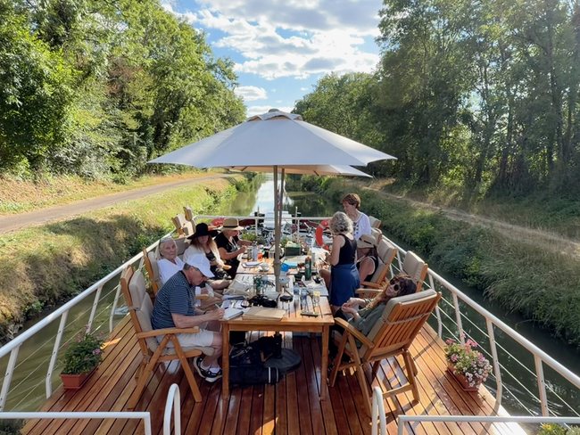 Art Cruise guests painting while cruising through Burgundy